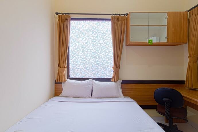 Imagen de la habitación del Hotel Rumah Verde. Foto 9