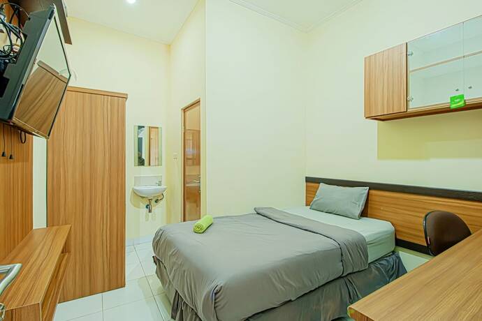 Imagen de la habitación del Hotel Rumah Verde. Foto 12