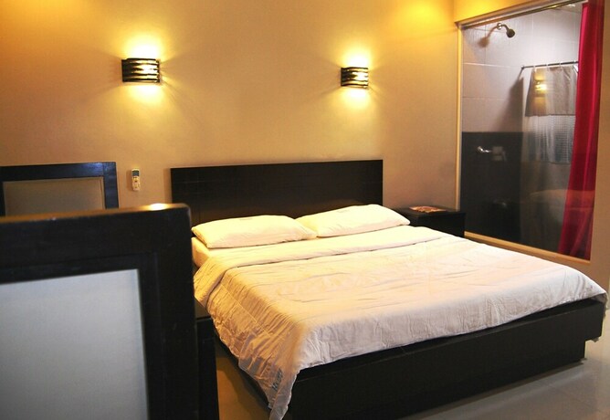 Imagen de la habitación del Hotel Rumi Apartelle. Foto 25