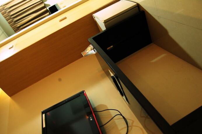 Imagen de la habitación del Hotel Rumi Apartelle. Foto 26