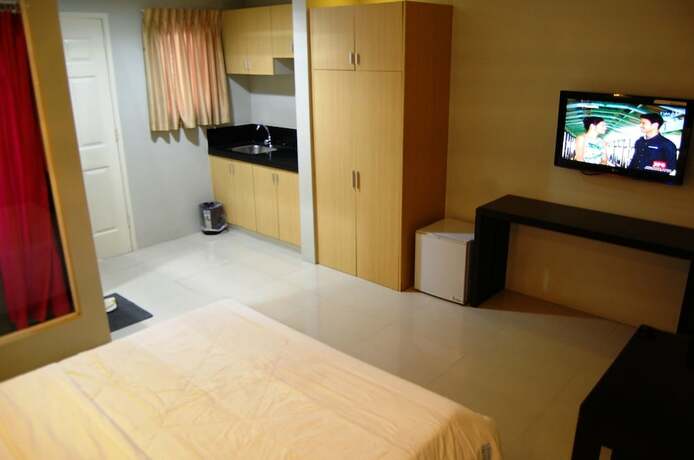 Imagen de la habitación del Hotel Rumi Apartelle. Foto 31