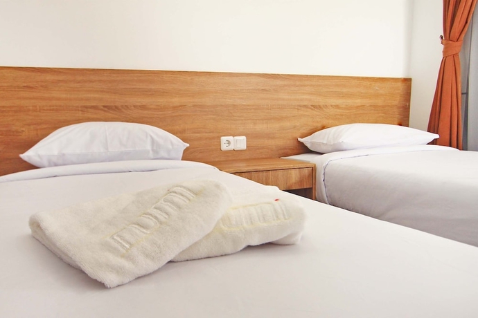 Imagen de la habitación del Hotel Rumi Semarang. Foto 2