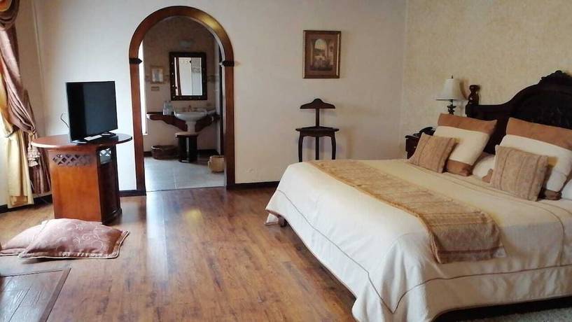 Imagen de la habitación del Hotel Rumipamba de las Rosas. Foto 2