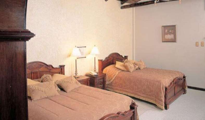Imagen de la habitación del Hotel Rumipamba de las Rosas. Foto 3