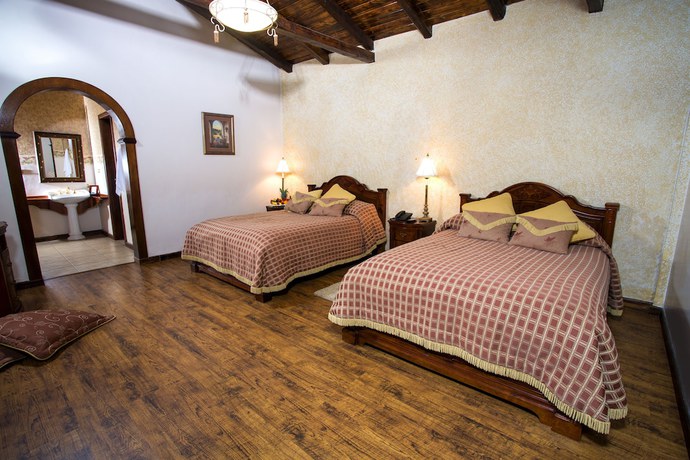 Imagen de la habitación del Hotel Rumipamba de las Rosas. Foto 5
