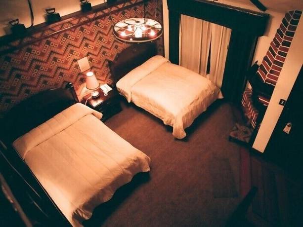 Imagen de la habitación del Hotel Rumipamba de las Rosas. Foto 7