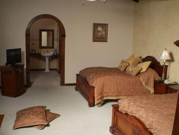Imagen de la habitación del Hotel Rumipamba de las Rosas. Foto 15