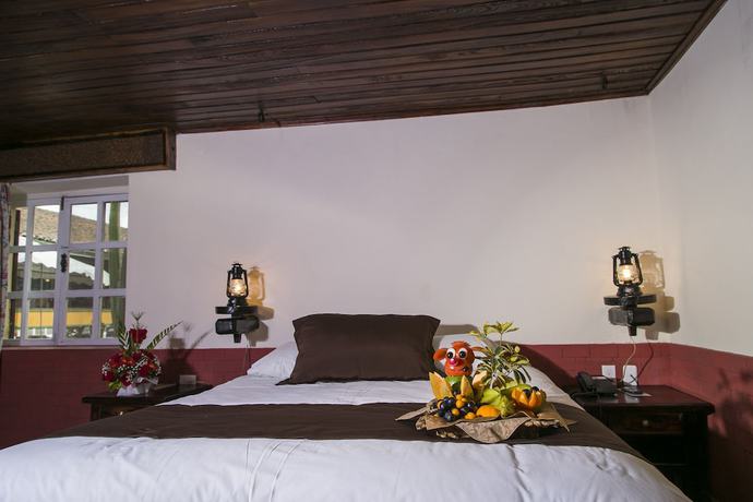 Imagen de la habitación del Hotel Rumipamba de las Rosas. Foto 19