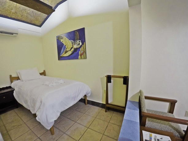 Imagen de la habitación del Hotel Rumors Resort. Foto 10