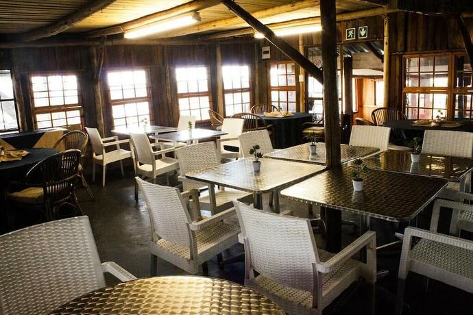 Imagen del bar/restaurante del Hotel Run N' Fire Garden Court. Foto 14