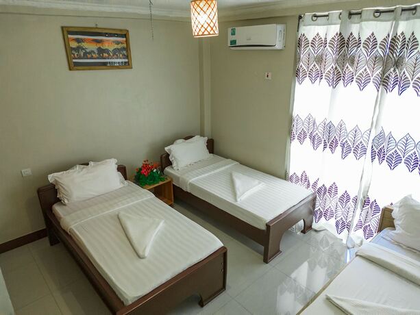 Imagen de la habitación del Hotel Runako lodge, ARUSHA. Foto 14