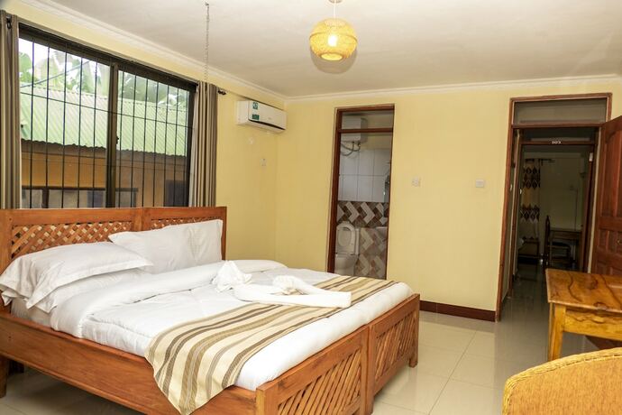 Imagen de la habitación del Hotel Runako lodge, ARUSHA. Foto 17