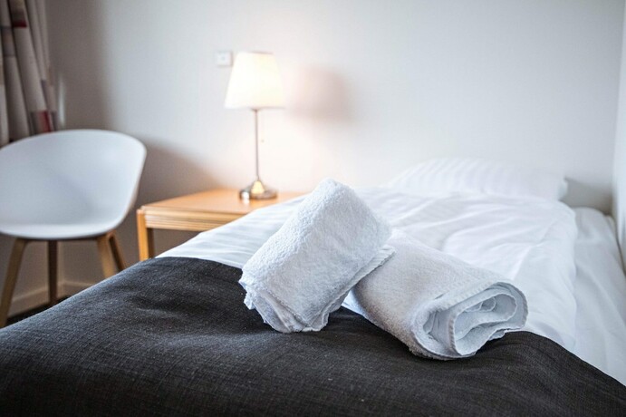 Imagen de la habitación del Hotel Runavik. Foto 15