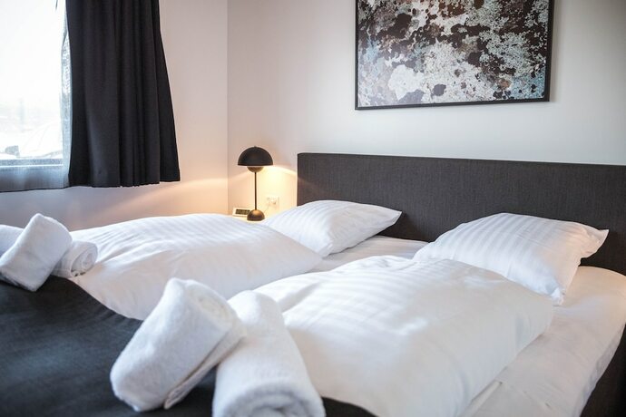 Imagen de la habitación del Hotel Runavik. Foto 18