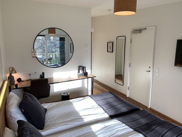 Imagen de la habitación del Hotel Rungstedgaard. Foto 5