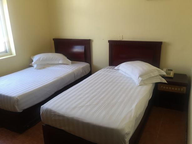Imagen de la habitación del Hotel Rungwe Palace. Foto 11