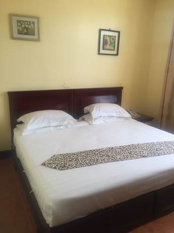 Imagen de la habitación del Hotel Rungwe Palace. Foto 12