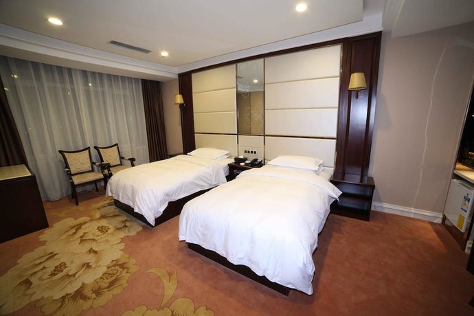Imagen de la habitación del Hotel Runzeng Hotel. Foto 2