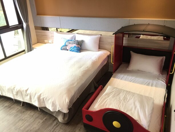 Imagen de la habitación del Hotel Ruo Shui Hotspring. Foto 16