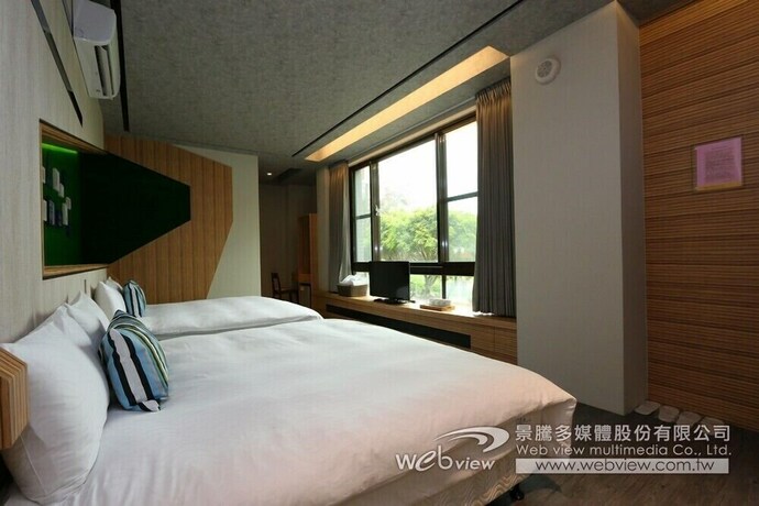 Imagen de la habitación del Hotel Ruo Shui Hotspring. Foto 23