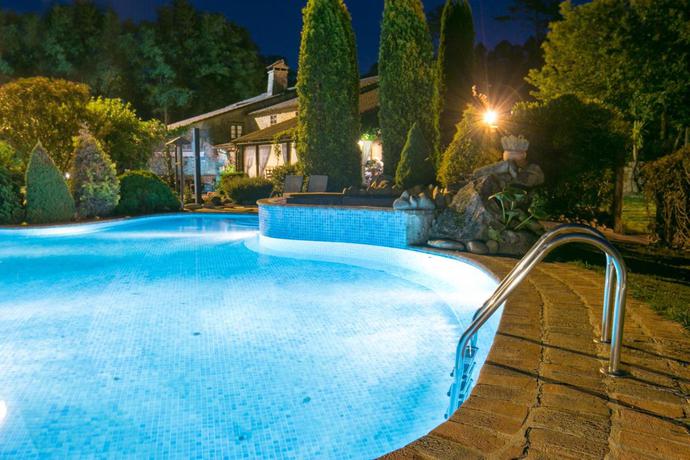 Imagen de la piscina del Hotel Rural Aldea Os Mui&ntilde;os. Foto 10