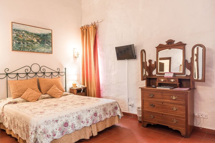 Imagen de la habitación del Hotel Rural Biniarroca - Adults Only. Foto 13