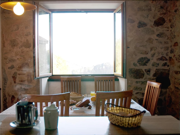 Imagen del bar/restaurante del Hotel Rural CASA FONTEQUEIROSO (MUXÍA). Foto 2