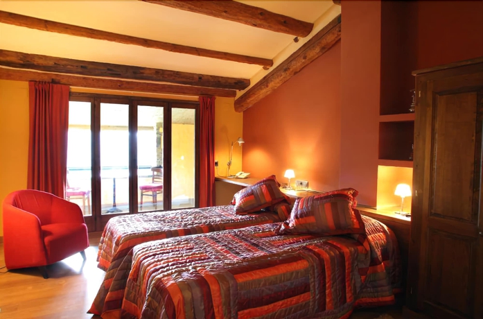 Imagen de la habitación del Hotel Rural Campalans. Foto 7