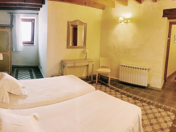 Imagen de la habitación del Hotel Rural Can Bayre. Foto 17