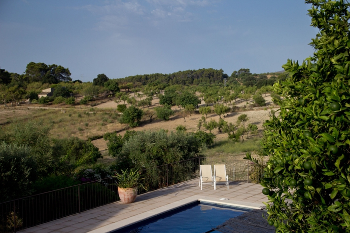 Imagen de la piscina del Hotel Rural Can Calco Petit. Foto 13