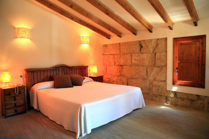 Imagen de la habitación del Hotel Rural Can Calco Petit. Foto 7