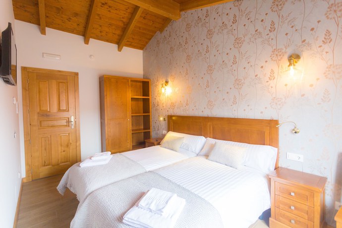 Imagen de la habitación del Hotel Rural Casa Da Ponte De Penas. Foto 11