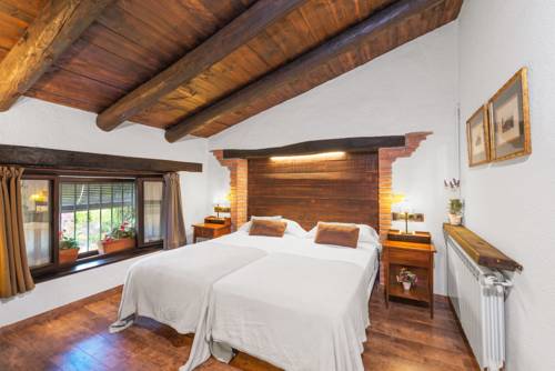 Imagen de la habitación del Hotel Rural Comarquinal Bioresort Penedès. Foto 3