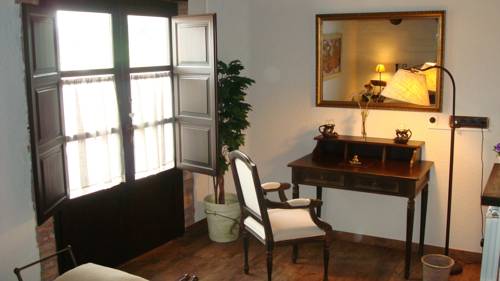 Imagen de la habitación del Hotel Rural Comarquinal Bioresort Penedès. Foto 7