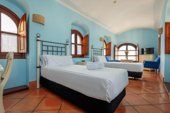 Imagen de la habitación del Hotel Rural Complejo Tur&iacute;stico Tugasa Castillo De Castellar. Foto 10