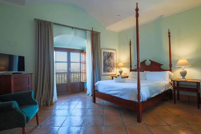Imagen de la habitación del Hotel Rural Complejo Tur&iacute;stico Tugasa Castillo De Castellar. Foto 12