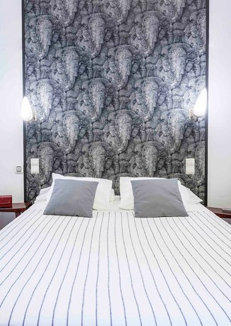 Imagen de la habitación del Hotel Rural El Torreón De Navacerrada. Foto 12