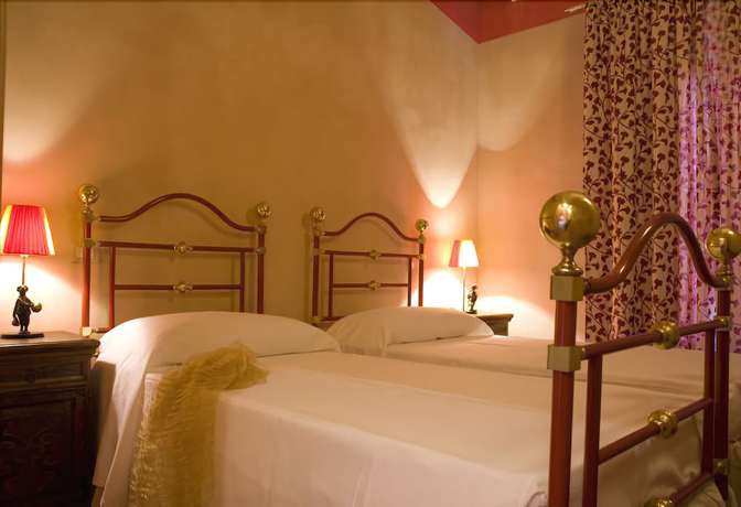 Imagen de la habitación del Hotel Rural Guadalupe Tuscany Resort. Foto 4