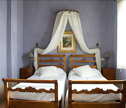 Imagen de la habitación del Hotel Rural Guadalupe Tuscany Resort. Foto 11