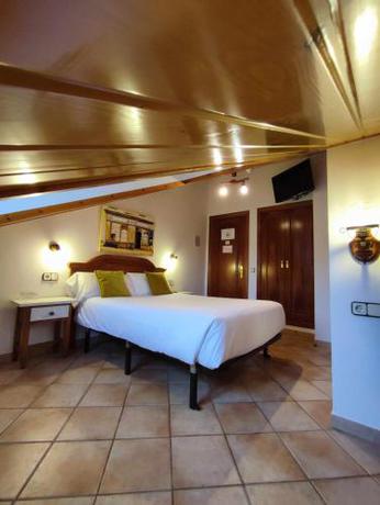 Imagen de la habitación del Hotel Rural LAbadia de Sieste. Foto 12