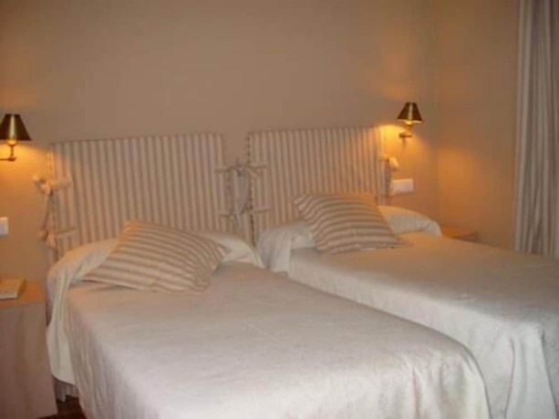 Imagen de la habitación del Hotel Rural La Puerta de la Ribera. Foto 16