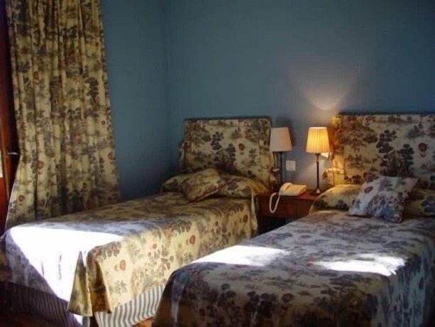 Imagen de la habitación del Hotel Rural La Puerta de la Ribera. Foto 17