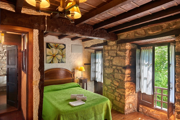 Imagen de la habitación del Hotel Rural La Tahona De Besnes. Foto 11