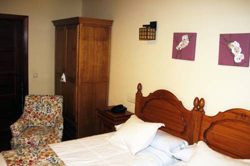 Imagen de la habitación del Hotel Rural Las Farolas, Los &Aacute;ngeles de San Rafael. Foto 4