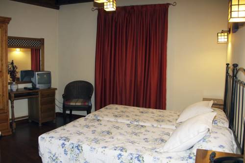 Imagen de la habitación del Hotel Rural Las Farolas, Los &Aacute;ngeles de San Rafael. Foto 5