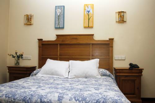 Imagen de la habitación del Hotel Rural Las Farolas, Los &Aacute;ngeles de San Rafael. Foto 9