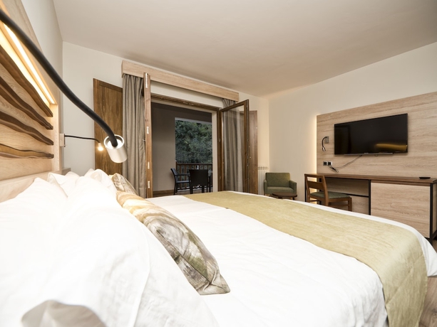 Imagen de la habitación del Hotel Rural Las Montañas de Pumar. Foto 13