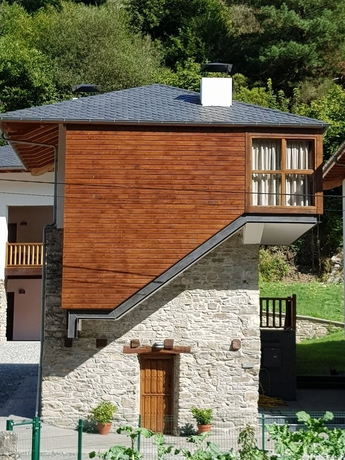 Imagen de la habitación del Hotel Rural Las Montañas de Pumar. Foto 15