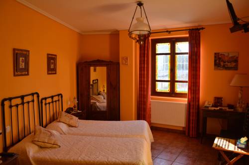 Imagen de la habitación del Hotel Rural Mar De Queo. Foto 9