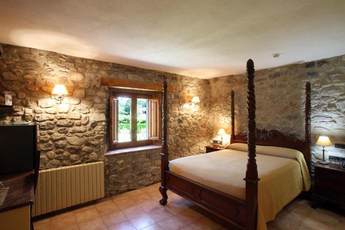 Imagen de la habitación del Hotel Rural Mas La Casassa. Foto 2